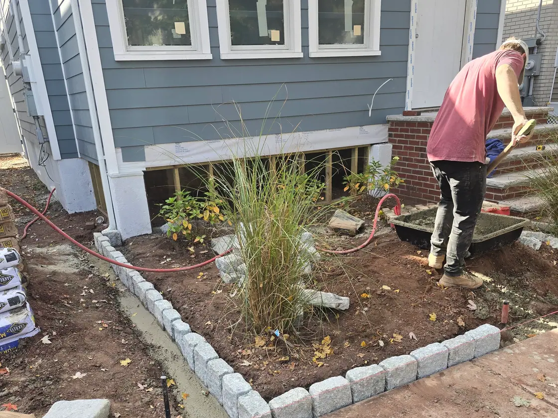 The same front garden while Belgian-block edging was being installed